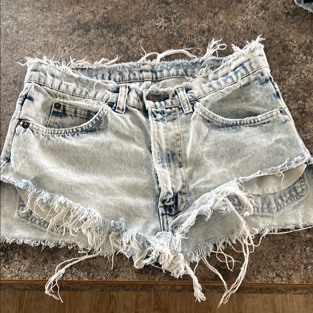 Levi's Blue Jean Shorts with Frayed Edges and Vintage Look